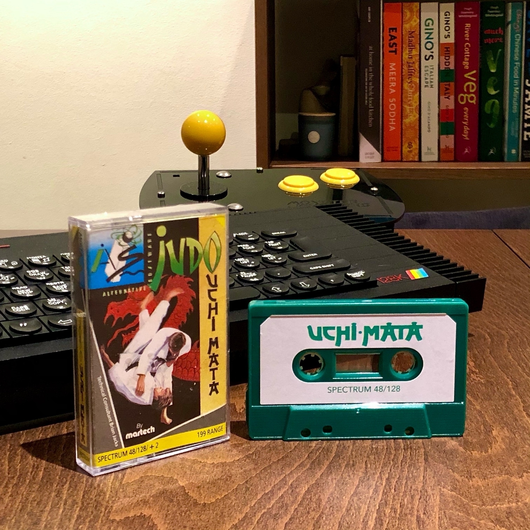 original cassette case and inlay card with new cassette featuring a printed label